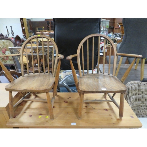 806 - A PAIR OF SMALL HOOP BACK ARMCHAIRS