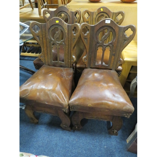 828 - A SET OF FOUR ANTIQUE CARVED OAK CHURCH STYLE CHAIRS