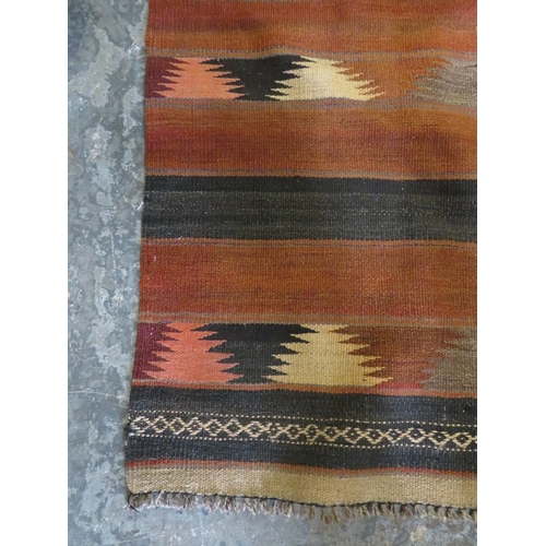 846 - A LARGER EASTERN WOOLLEN RUG 183 X 137 CM