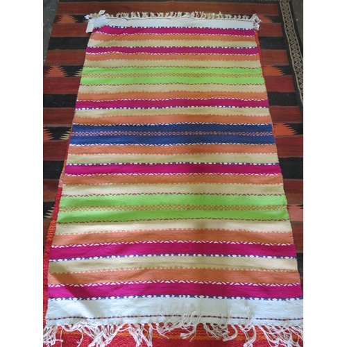 848 - A STRIPED WOOLLEN RUG - 90 X 150 CM