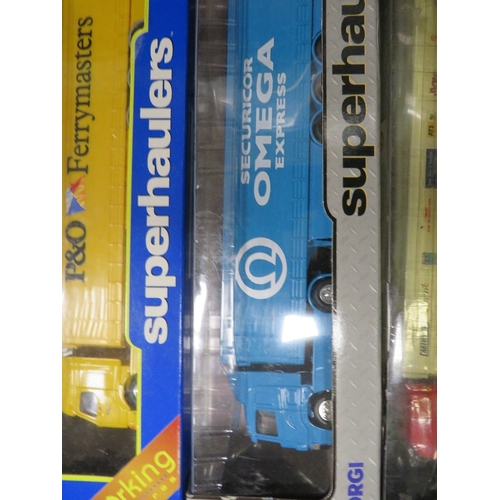 70 - TWELVE BOXED CORGI ARTICULATED LORRIES AND TRAILERS TO INCLUDE ESSO TANKER, KIT KAT, P&O FERRYMASTER... 