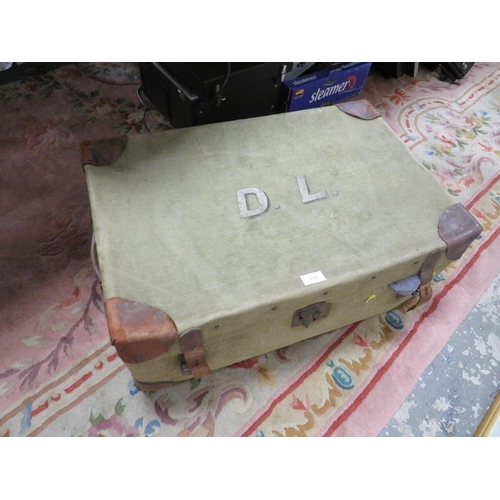 115 - A GREEN CABIN TRUNK CONTAINING A LARGE QUANTITY OF NEEDLE WORK AND LINEN