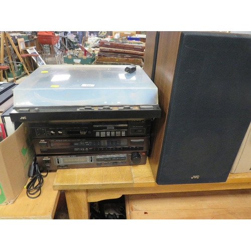 134 - A VINTAGE JVC STACKING STEREO SYSTEM TO INCLUDE AN INTEGRATED AMP FLIER, TOGETHER WITH JVC TURNTABLE... 