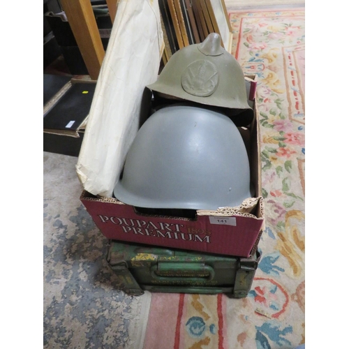 141 - A TRAY OF ASSORTED MILITARY COLLECTABLE'S TO INCLUDE HELMETS, GRENADE CRATE AND A COLLECTION OF RAF ... 