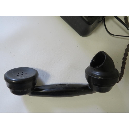 245 - A VINTAGE TELEPHONE WITH MODERN CABLE TELEPHONE ADAPTER (UNCHECKED)