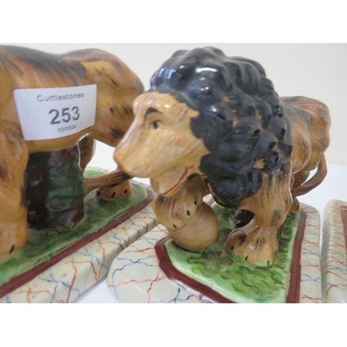 253 - FOUR REPRODUCTION STAFFORDSHIRE STYLE LIONS FIGURES