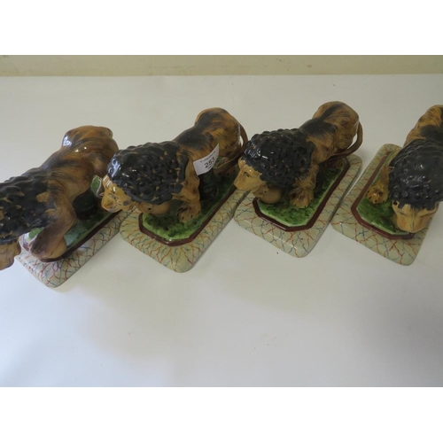 253 - FOUR REPRODUCTION STAFFORDSHIRE STYLE LIONS FIGURES