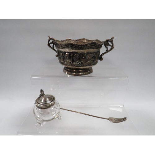 370 - A HALLMARKED SILVER TOPPED GLASS MUSTARD POT ALONG WITH AN EASTERN WHITE METAL TWIN HANDLED BOWL AND... 