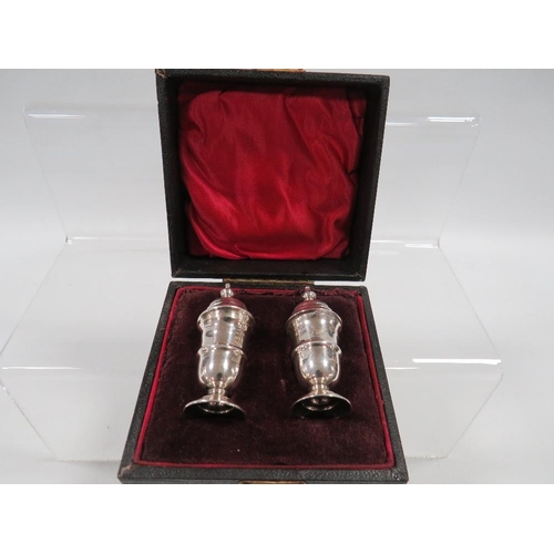 374 - A BOXED SILVER HALLMARKED SALT & PEPPER SET