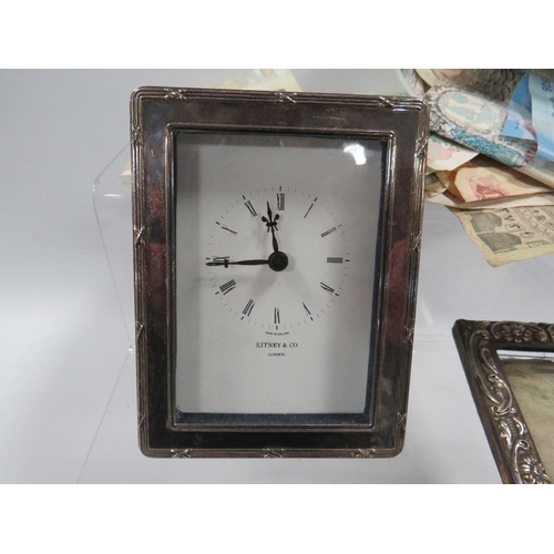 381 - A SMALL HALLMARKED SILVER PHOTO FRAME TOGETHER WITH WHITE METAL FRAMED DESK CLOCK AND A COLLECTION O... 