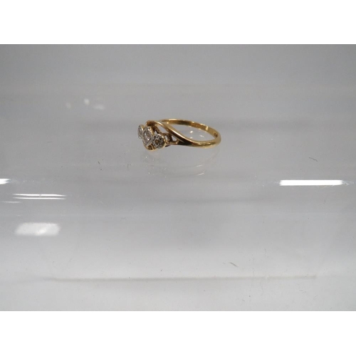 398 - AN 18CT YELLOW GOLD THREE STONE DIAMOND RING approx weight 2.4g