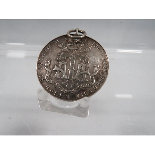 418 - AN ANTIQUE SILVER ATA MEDAL