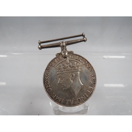 419 - A SILVER 1939 - 1945 WAR MEDAL