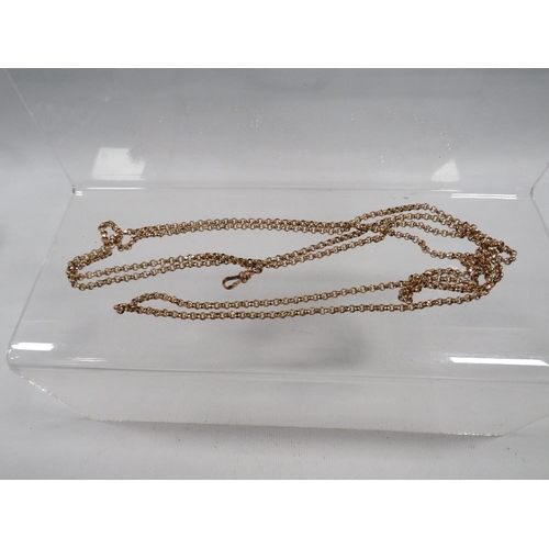 421 - A ROLLED GOLD LONG MUFF CHAIN