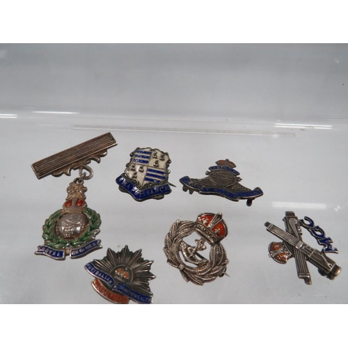 422 - SIX SILVER AND ENAMEL MILITARY BADGES