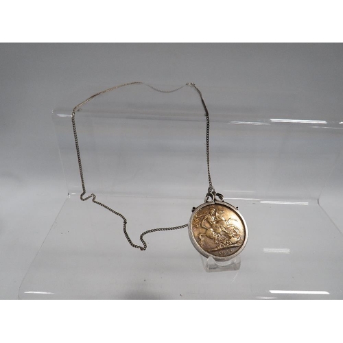 425 - A 1889 SILVER CROWN PENDANT NECKLACE