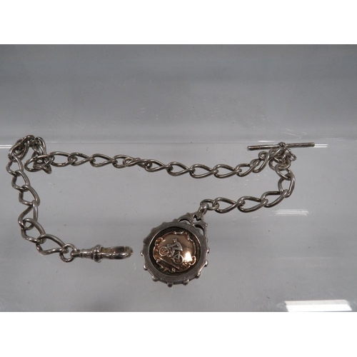 427 - AN ANTIQUE SILVER GENTS POCKET WATCH ALBERT CHAIN