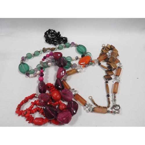 441 - A BAG OF COSTUME JEWELLERY