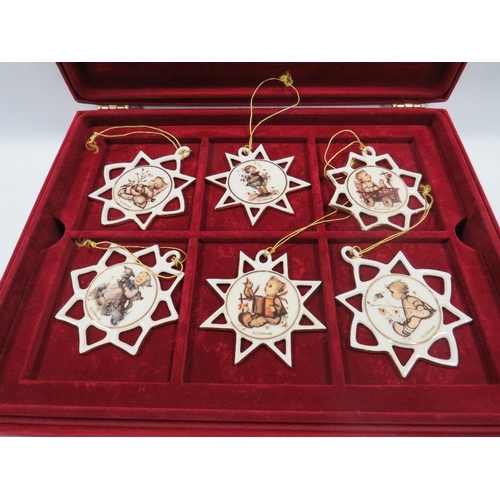 444 - A PRESENTATION CASE OF 12 M.J. HUMMEL PORCELAIN CHRISTMAS TREE DECORATIONS