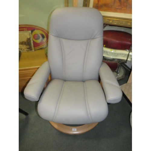 701 - AN EKORNES STRESSLESS ARMCHAIR & STOOL