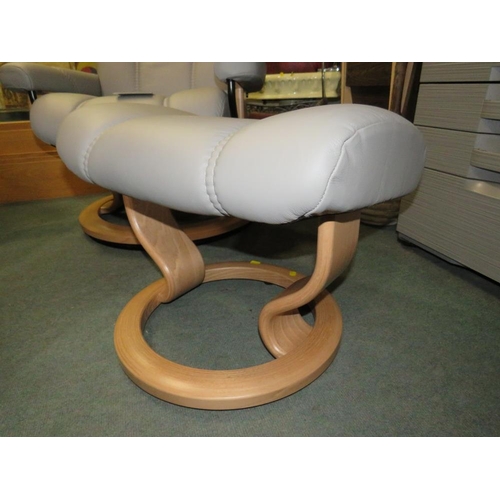 701 - AN EKORNES STRESSLESS ARMCHAIR & STOOL