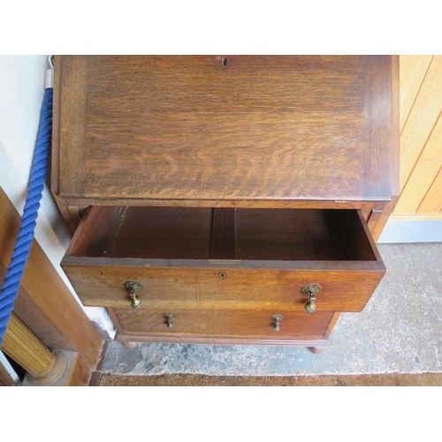 706 - A SMALL OAK 20TH CENTURY BUREAU