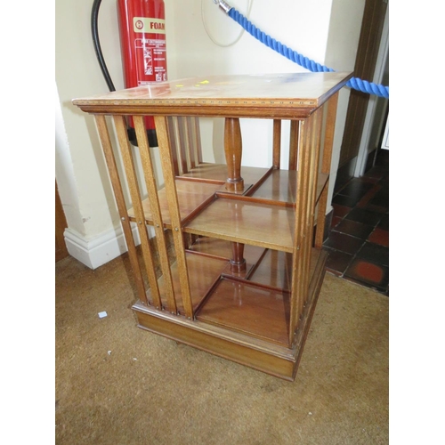 708 - AN EDWARDIAN MAHOGANY INLAID REVOLVING BOOKCASE