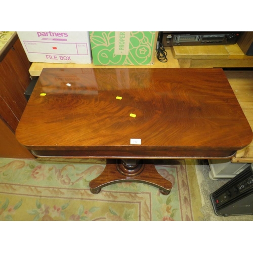 712 - A 19TH CENTURY MAHOGANY FOLD-OVER TEA TABLE ON QUATREFOIL BASE