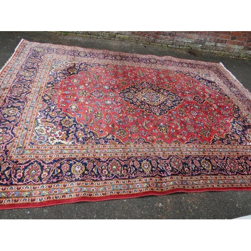 715 - A LARGE G.H.FRITH IRAN WOOLLEN RUG -  350  X  250 CM