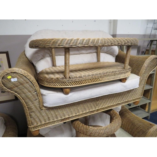 717 - A LARGE SIX PIECE WICKER CONSERVATORY SUITE