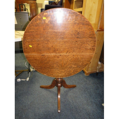 746 - A 19TH CENTURY CIRCULAR OAK TILE TOP TABLE