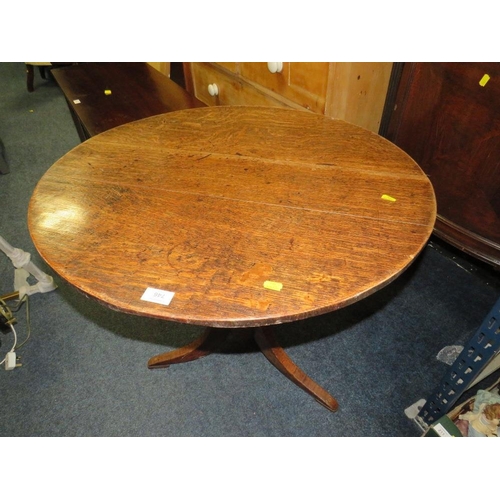 746 - A 19TH CENTURY CIRCULAR OAK TILE TOP TABLE