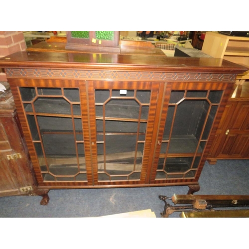 756 - A 20TH CENTURY MAHOGANY GLAZED THREE DOOR BOOKCASE ON BALL AND CLAW FEET 126 X 145 CM