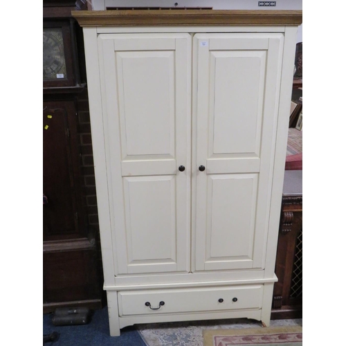 762 - A MODERN CREAM AND OAK DOUBLE WARDROBE WITH DRAWER