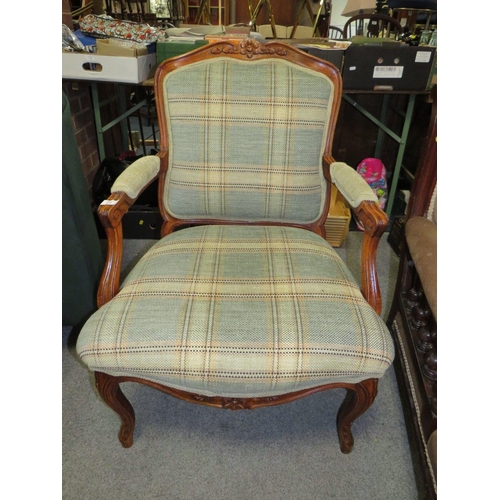 772 - A FRENCH STYLE UPHOLSTERED ARMCHAIR