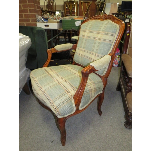 772 - A FRENCH STYLE UPHOLSTERED ARMCHAIR