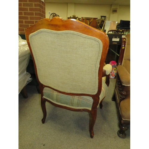 772 - A FRENCH STYLE UPHOLSTERED ARMCHAIR