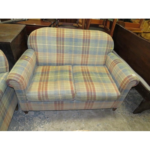 775 - A PAIR OF MODERN CHECKED TWO SEATER SETTEES