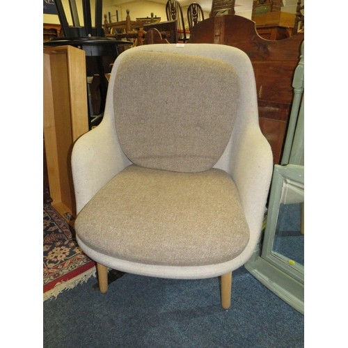 780 - A MODERN UPHOLSTERED ARMCHAIR