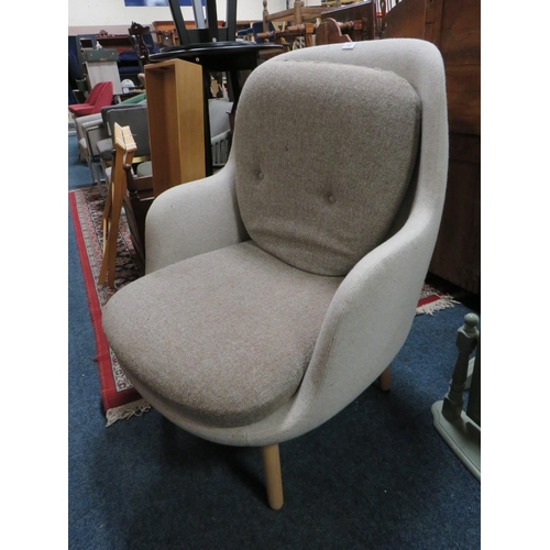 780 - A MODERN UPHOLSTERED ARMCHAIR