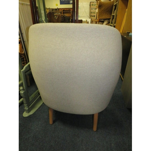 780 - A MODERN UPHOLSTERED ARMCHAIR