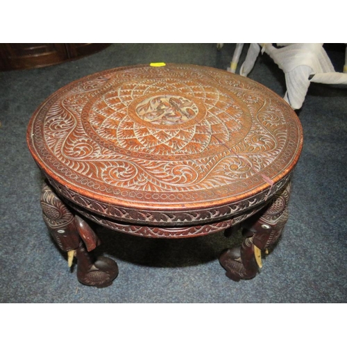 784 - A SMALL VINTAGE HOOPBACK CHAIR AND AN ELEPHANT CARVED TABLE (2)