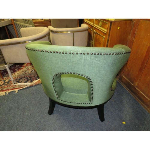 788 - A MODERN GREEN OVER-SIZED OPEN ARMCHAIR