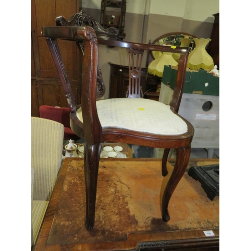 797 - AN ANTIQUE CARVED MAHOGANY CORNER CHAIR