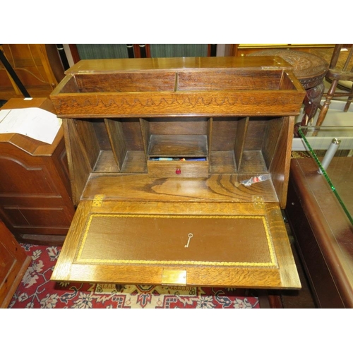 801 - A VINTAGE OAK STUDENTS BUREAU AND TWO BARLEY TWIST TABLES