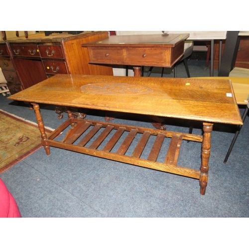 802 - AN OAK CARVED COFFEE TABLE