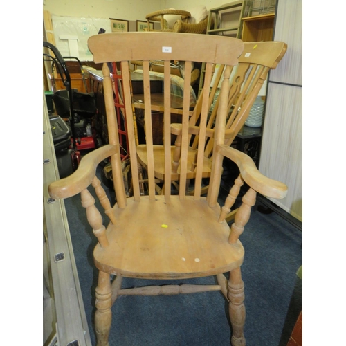 804 - A HEAVY PINE KITCHEN ARMCHAIR