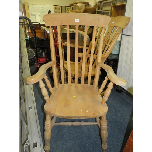 804 - A HEAVY PINE KITCHEN ARMCHAIR