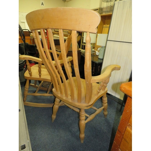 804 - A HEAVY PINE KITCHEN ARMCHAIR