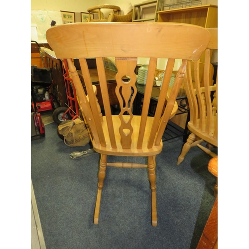 805 - A HEAVY PINE KITCHEN ROCKING CHAIR